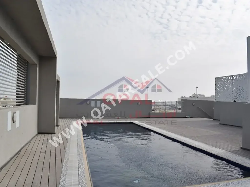 2 Bedrooms  Apartment  For Rent  in Doha -  Al Mansoura  Fully Furnished