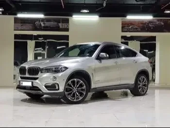 BMW  X-Series  X6  2015  Automatic  98,000 Km  8 Cylinder  All Wheel Drive (AWD)  SUV  Gold  With Warranty