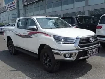 Toyota  Hilux  2023  Automatic  0 Km  4 Cylinder  Four Wheel Drive (4WD)  Pick Up  White  With Warranty