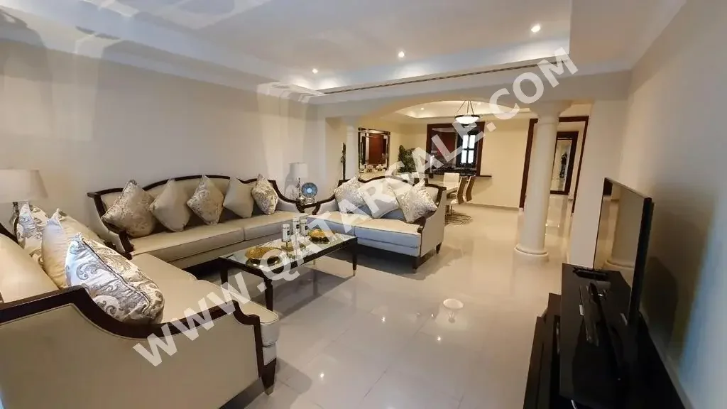 2 Bedrooms  Apartment  For Rent  in Doha -  The Pearl  Fully Furnished