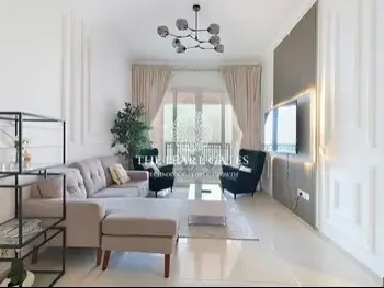 2 Bedrooms  Apartment  For Rent  in Doha -  The Pearl  Fully Furnished