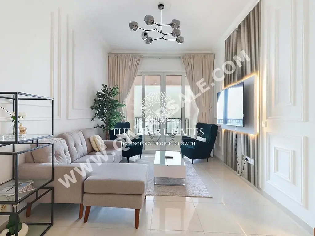 2 Bedrooms  Apartment  For Rent  in Doha -  The Pearl  Fully Furnished