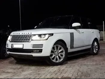 Land Rover  Range Rover  Vogue SE  2014  Automatic  254,000 Km  8 Cylinder  Four Wheel Drive (4WD)  SUV  White  With Warranty