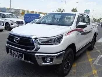 Toyota  Hilux  2023  Automatic  0 Km  4 Cylinder  Four Wheel Drive (4WD)  Pick Up  White  With Warranty