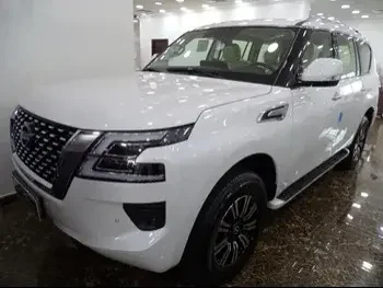 Nissan  Patrol  SE  2023  Automatic  0 Km  6 Cylinder  Four Wheel Drive (4WD)  SUV  White  With Warranty