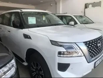 Nissan  Patrol  XE  2023  Automatic  0 Km  6 Cylinder  Four Wheel Drive (4WD)  SUV  White  With Warranty