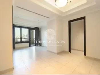 1 Bedrooms  Apartment  For Rent  in Doha -  The Pearl  Semi Furnished