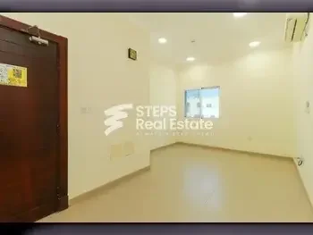 2 Bedrooms  Apartment  For Rent  in Doha -  Al Hilal  Not Furnished