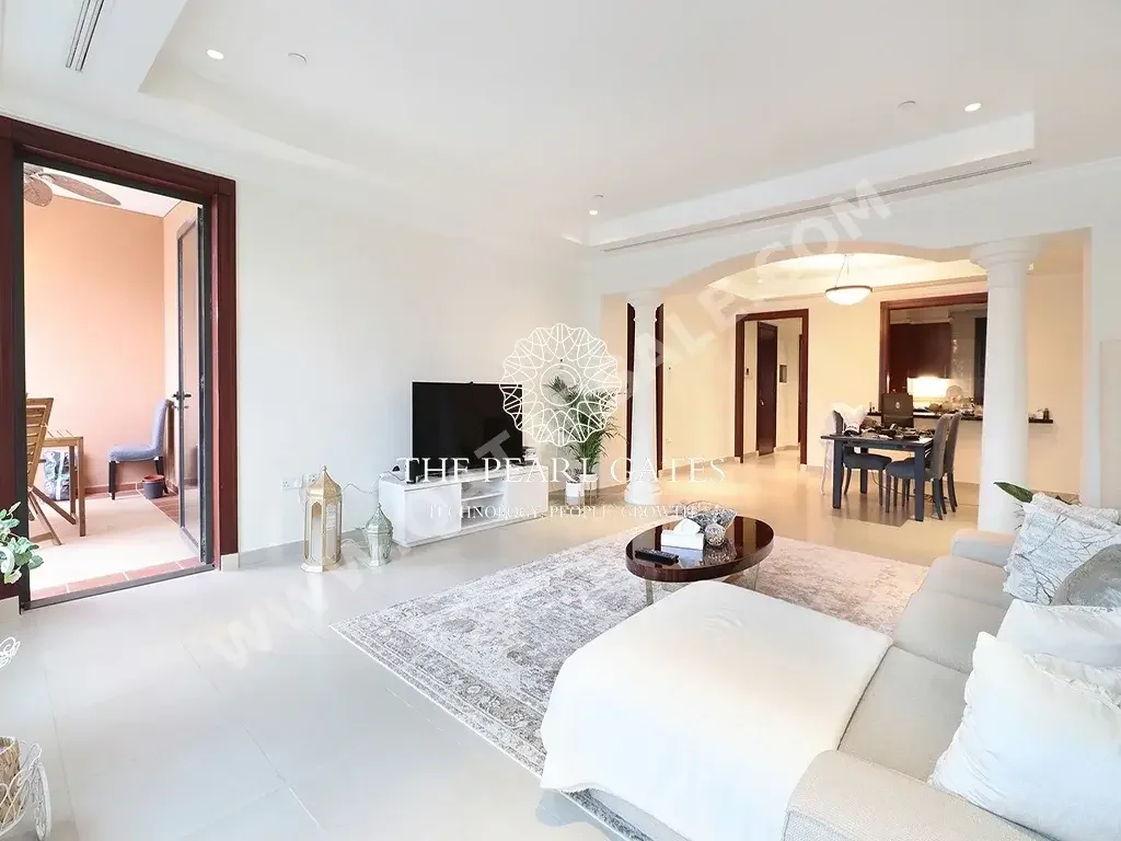 2 Bedrooms  Apartment  For Rent  in Doha -  The Pearl  Fully Furnished