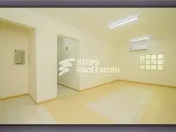 3 Bedrooms  Apartment  For Rent  in Doha -  Madinat Khalifa South  Not Furnished