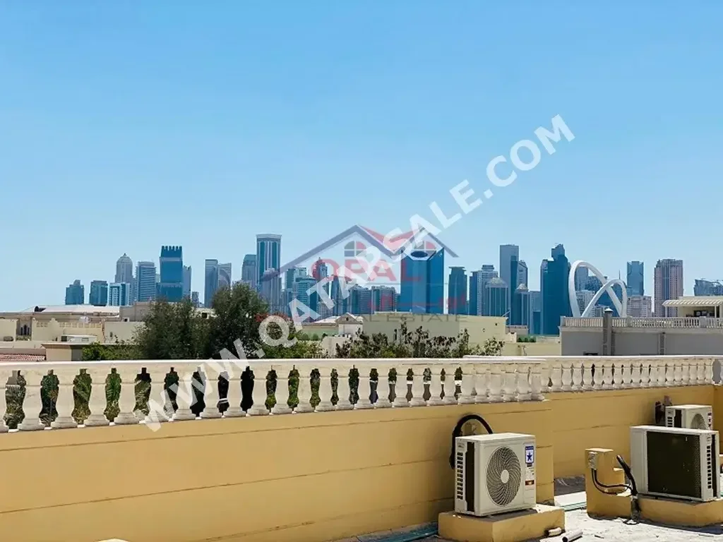 2 Bedrooms  Apartment  For Rent  in Doha -  Onaiza  Not Furnished