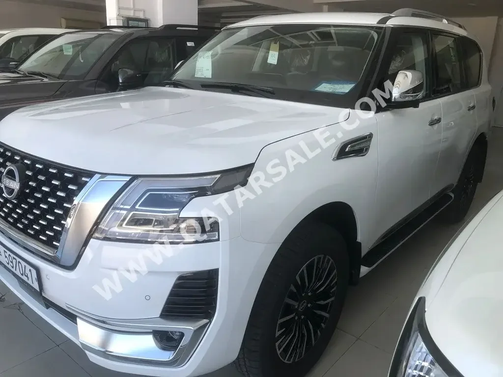  Nissan  Patrol  Platinum  2023  Automatic  0 Km  6 Cylinder  Four Wheel Drive (4WD)  SUV  White  With Warranty