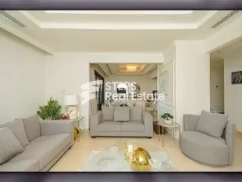 2 Bedrooms  Apartment  For Rent  in Doha -  The Pearl  Fully Furnished