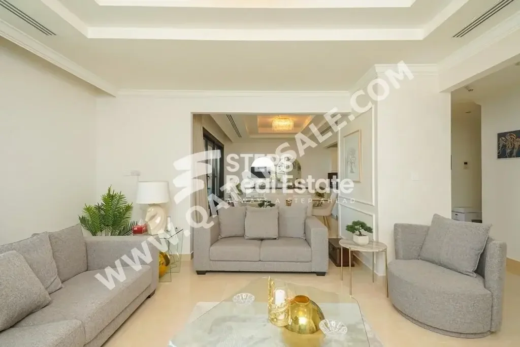 2 Bedrooms  Apartment  For Rent  in Doha -  The Pearl  Fully Furnished