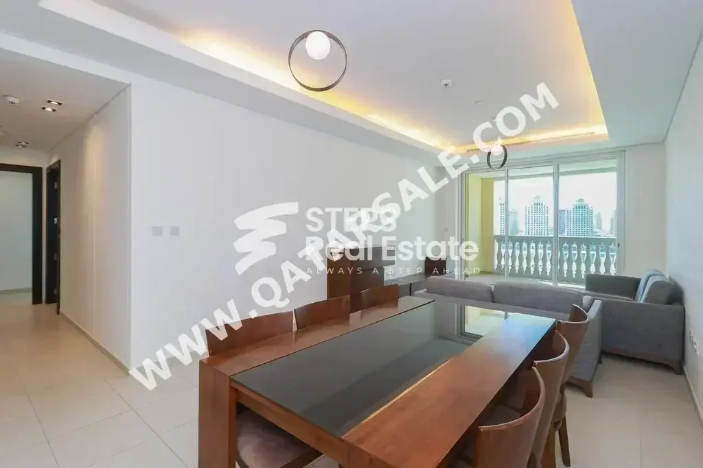 2 Bedrooms  Apartment  For Rent  in Doha -  The Pearl  Fully Furnished