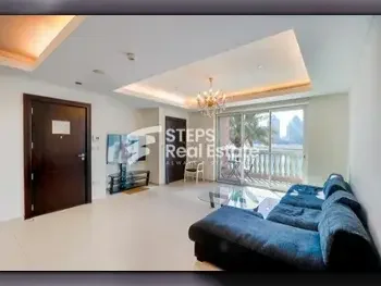 2 Bedrooms  Apartment  For Rent  in Doha -  The Pearl  Semi Furnished