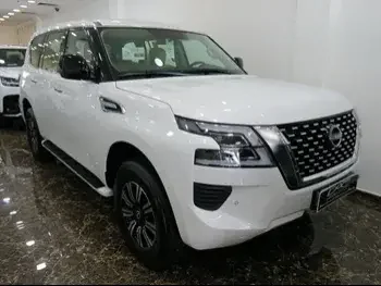 Nissan  Patrol  XE  2023  Automatic  0 Km  6 Cylinder  Four Wheel Drive (4WD)  SUV  White  With Warranty