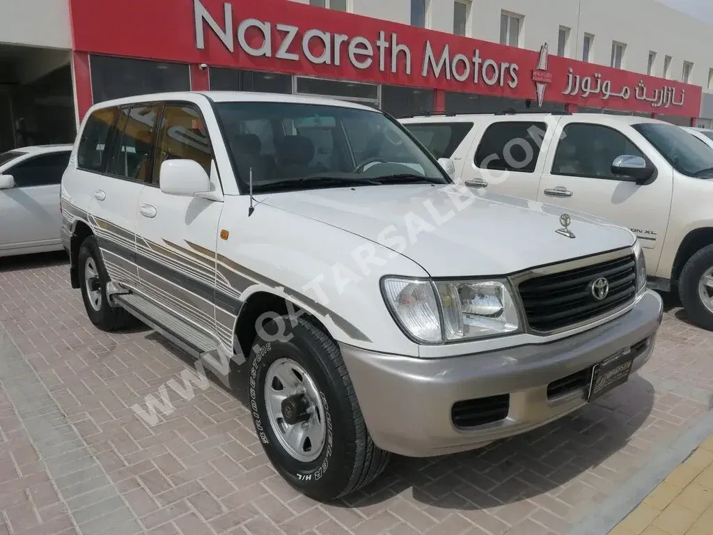 Toyota  Land Cruiser  GXR  2002  Automatic  93,000 Km  6 Cylinder  Four Wheel Drive (4WD)  SUV  White  With Warranty
