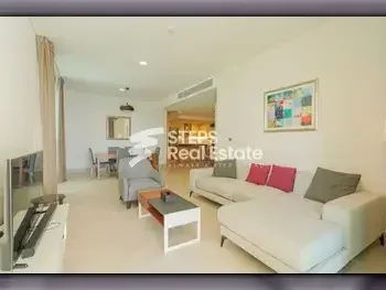 2 Bedrooms  Apartment  For Rent  in Doha -  The Pearl  Fully Furnished