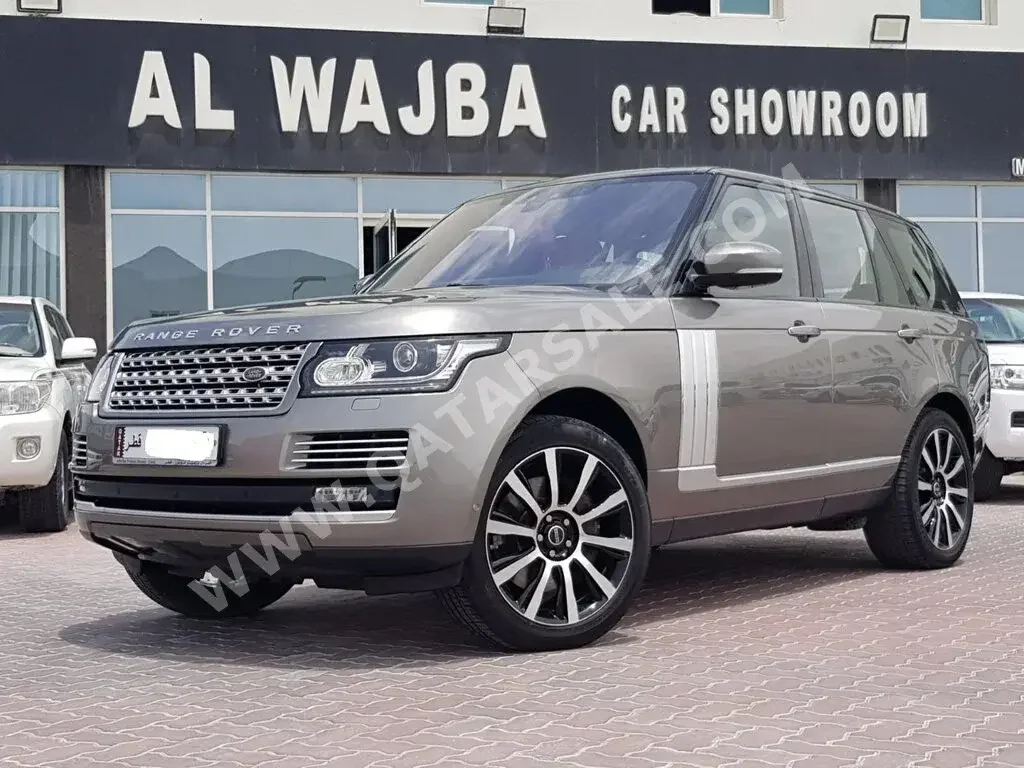 Land Rover  Range Rover  Vogue SE Super charged  2017  Automatic  100,000 Km  8 Cylinder  Four Wheel Drive (4WD)  SUV  Gold  With Warranty