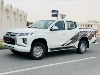 Mitsubishi  L 200  2020  Manual  123,000 Km  4 Cylinder  Four Wheel Drive (4WD)  Pick Up  White