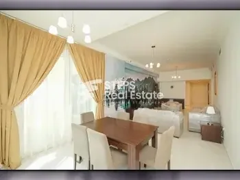 2 Bedrooms  Apartment  For Rent  in Doha -  The Pearl  Fully Furnished