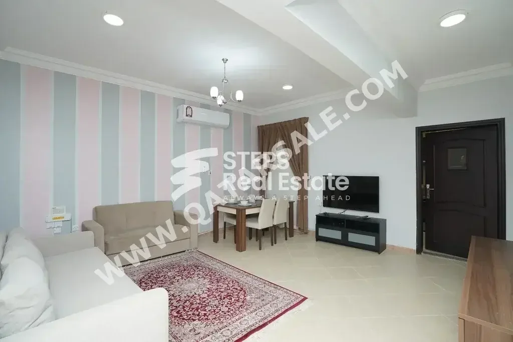 2 Bedrooms  Apartment  For Rent  in Doha -  Al Mansoura  Fully Furnished