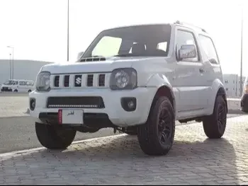 Suzuki  Jimny  2013  Automatic  156,000 Km  4 Cylinder  Four Wheel Drive (4WD)  SUV  White  With Warranty