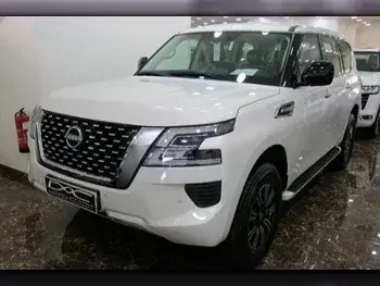 Nissan  Patrol  XE  2023  Automatic  0 Km  6 Cylinder  Four Wheel Drive (4WD)  SUV  White  With Warranty