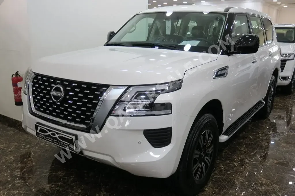 Nissan  Patrol  XE  2023  Automatic  0 Km  6 Cylinder  Four Wheel Drive (4WD)  SUV  White  With Warranty