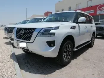 Nissan  Patrol  SE  2023  Automatic  0 Km  6 Cylinder  Four Wheel Drive (4WD)  SUV  White  With Warranty