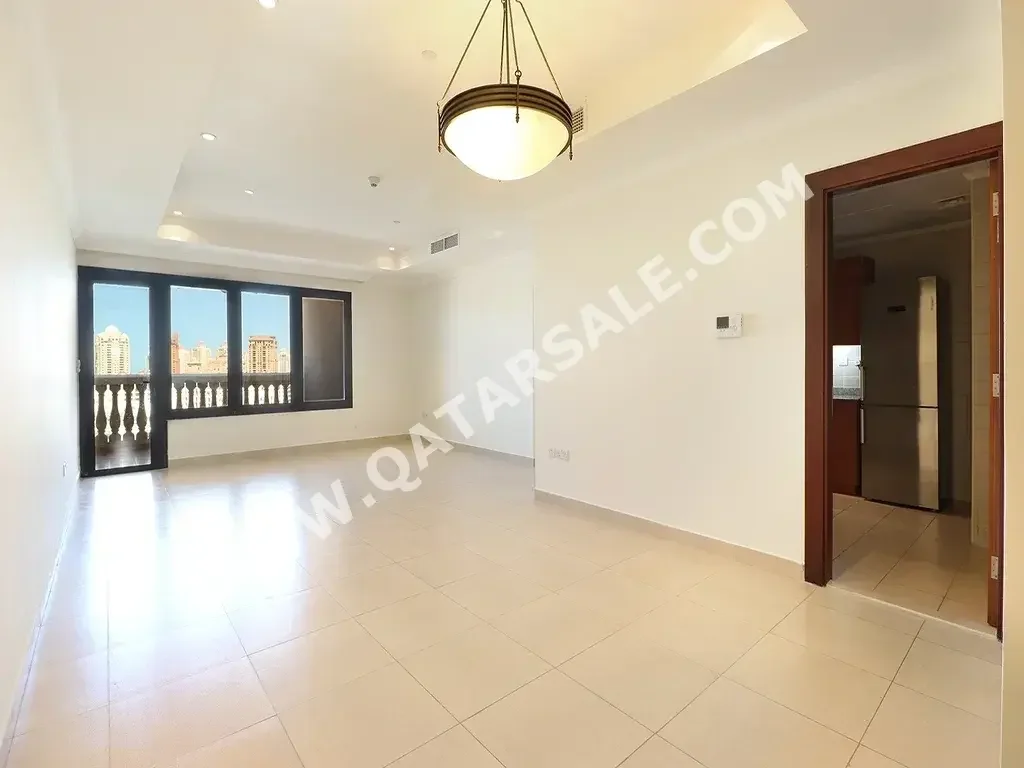 2 Bedrooms  Apartment  For Rent  in Doha -  The Pearl  Semi Furnished