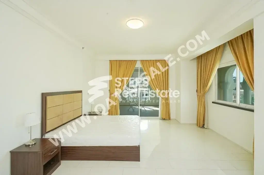 3 Bedrooms  Apartment  For Rent  in Doha -  The Pearl  Fully Furnished