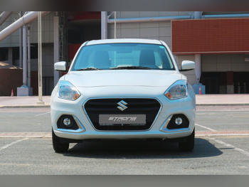 Suzuki  D zire  4 Cylinder  Sedan  White  2023