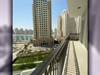 2 Bedrooms  Apartment  For Rent  in Doha -  The Pearl  Fully Furnished