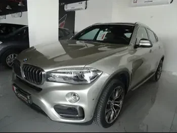 BMW  X-Series  X6  2015  Automatic  87,000 Km  6 Cylinder  Four Wheel Drive (4WD)  SUV  Gold  With Warranty