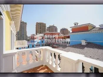 5 Bedrooms  Apartment  For Sale  in Doha -  The Pearl  Semi Furnished