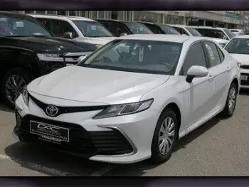 Toyota  Camry  LE  2023  Automatic  0 Km  4 Cylinder  Front Wheel Drive (FWD)  Sedan  White  With Warranty