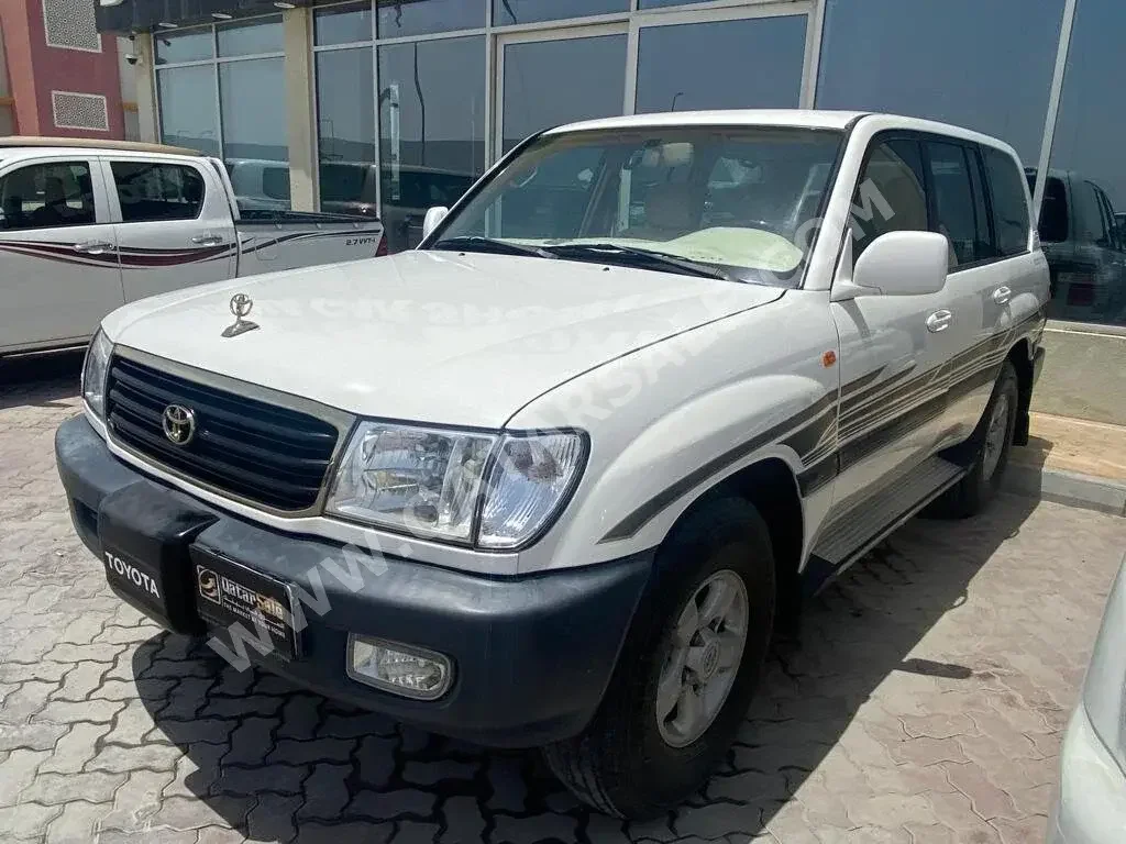 Toyota  Land Cruiser  GX  1998  Automatic  460,000 Km  6 Cylinder  Four Wheel Drive (4WD)  SUV  White  With Warranty