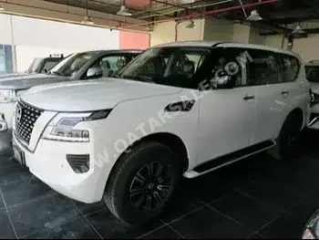 Nissan  Patrol  XE  2023  Automatic  0 Km  6 Cylinder  Four Wheel Drive (4WD)  SUV  White  With Warranty