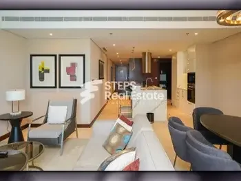 2 Bedrooms  Apartment  For Rent  in Doha -  The Pearl  Fully Furnished