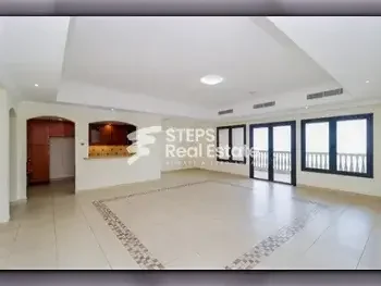 3 Bedrooms  Apartment  For Rent  in Doha -  The Pearl  Semi Furnished