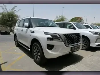 Nissan  Patrol  LE  2023  Automatic  0 Km  8 Cylinder  Four Wheel Drive (4WD)  SUV  White  With Warranty