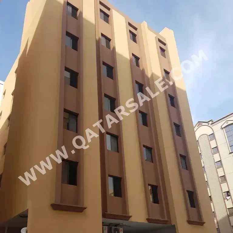 3 Bedrooms  Apartment  For Rent  in Doha -  Al Mansoura  Not Furnished