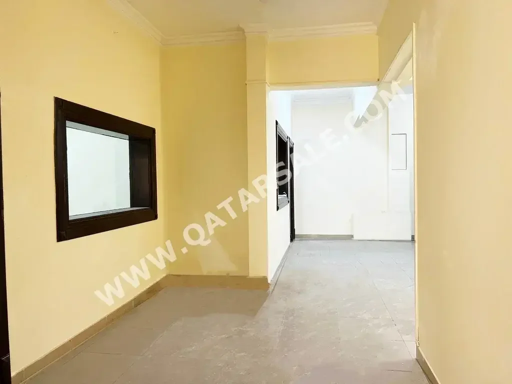 Labour Camp 3 Bedrooms  Apartment  For Rent  in Doha -  Al Sadd  Not Furnished