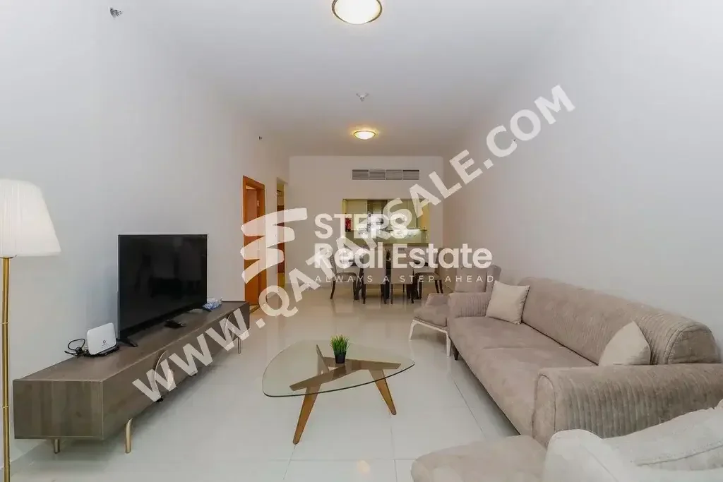 2 Bedrooms  Apartment  For Rent  in Doha -  The Pearl  Fully Furnished