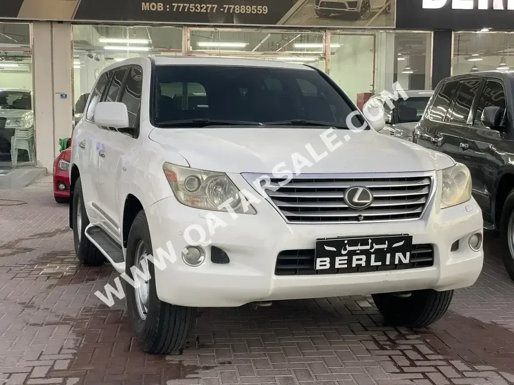 Lexus  LX  570  2009  Automatic  495,000 Km  8 Cylinder  Four Wheel Drive (4WD)  SUV  White  With Warranty