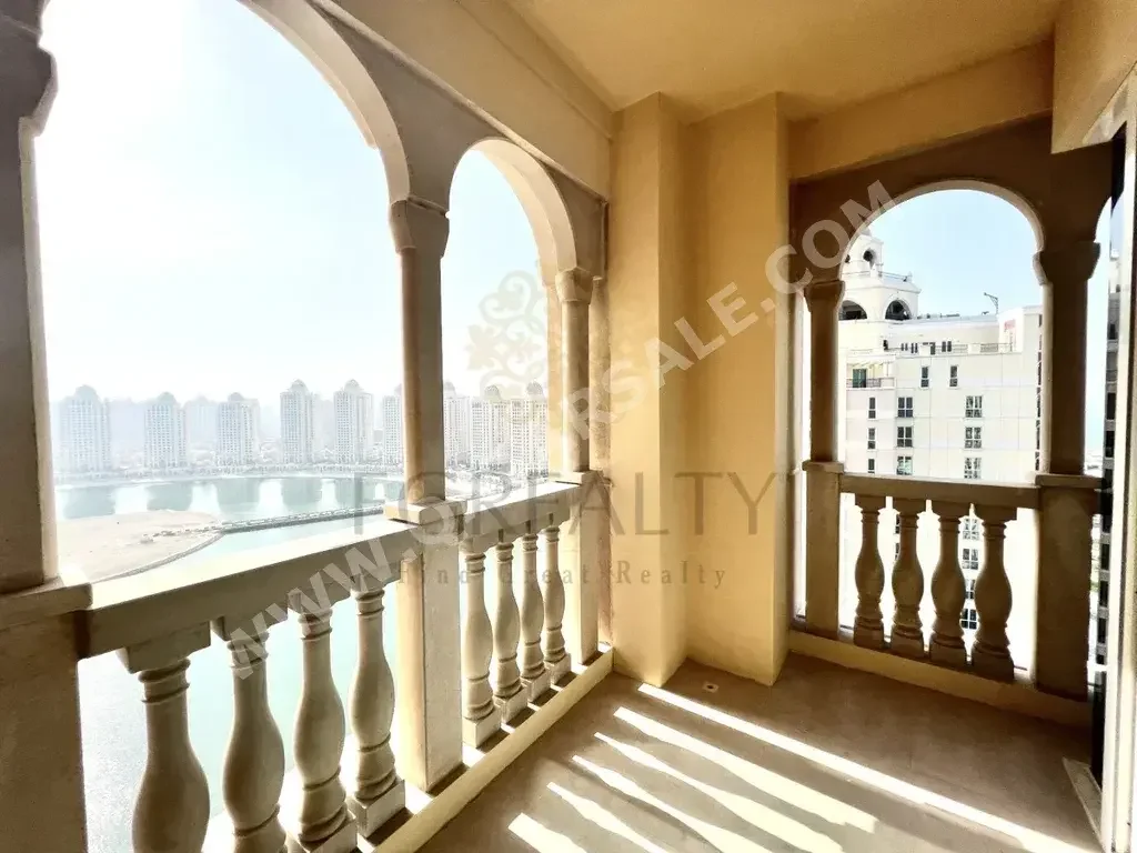 2 Bedrooms  Apartment  For Rent  in Doha -  The Pearl  Not Furnished