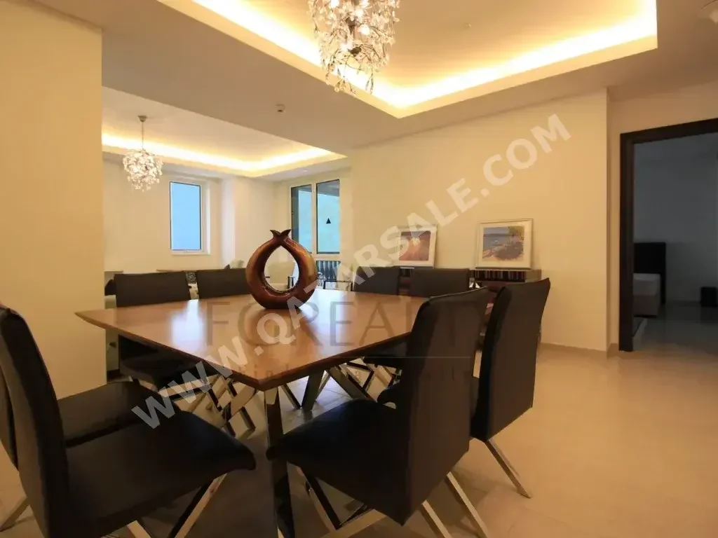 2 Bedrooms  Apartment  For Rent  in Doha -  The Pearl  Not Furnished