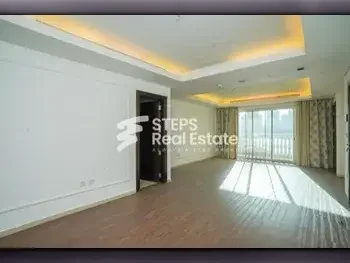 2 Bedrooms  Apartment  For Rent  in Doha -  The Pearl  Semi Furnished